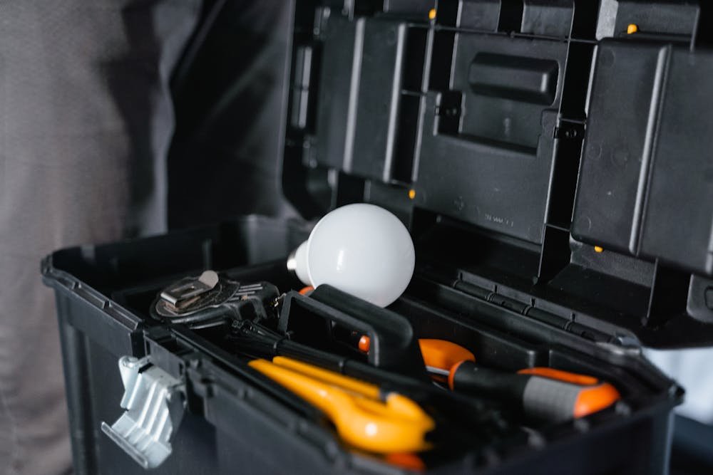 Open toolbox with maintenance tools for Manchester property repairs